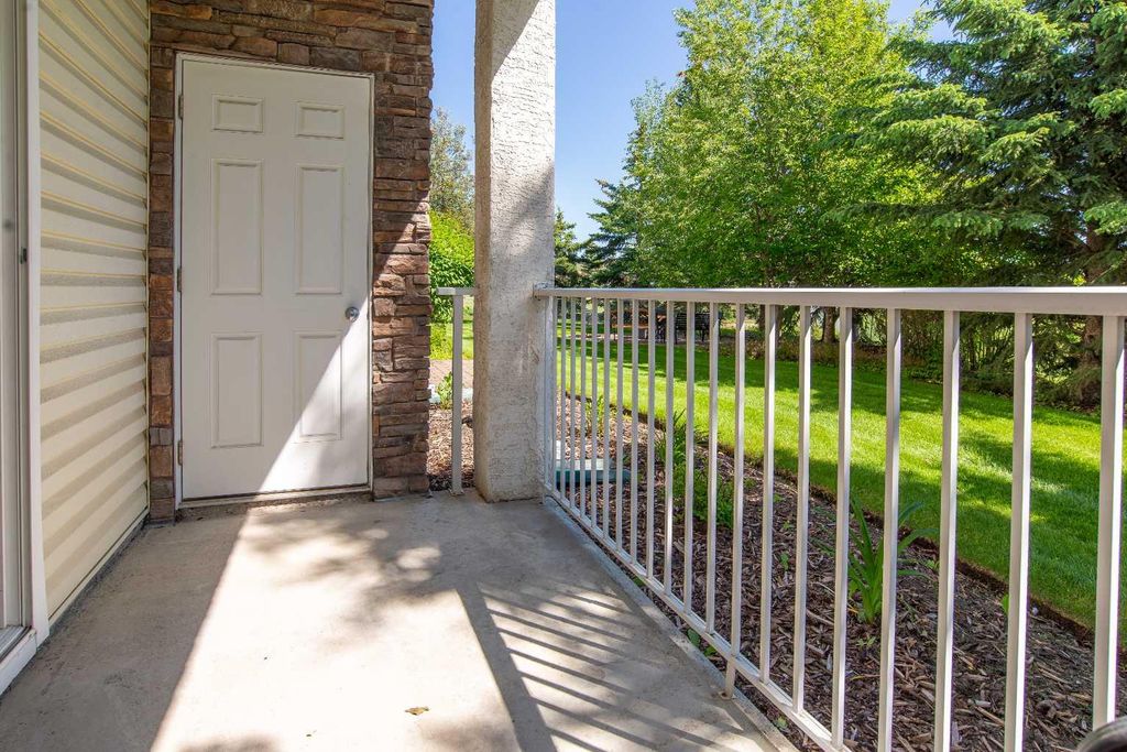 Photo of 72 Quigley Drive #112, Cochrane, AB T4C 2K6 (MLS # A2324594)