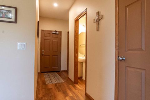 Photo of 72 Quigley Drive #112, Cochrane, AB T4C 2K6 (MLS # A2324594)