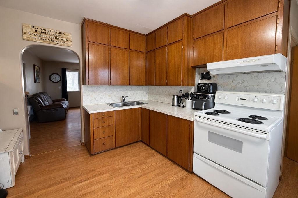 Photo of 1026 11 Avenue, Wainwright, AB T9W 1K6 (MLS # A2283231)