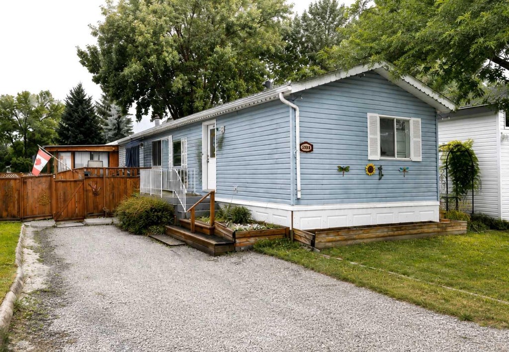 Photo of 209 Yardmaster Avenue, Coaldale, AB T1M 1P5 (MLS # A2338689)