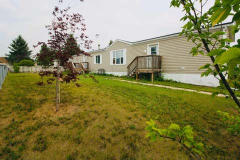 Photo of 10204 112 Avenue, High Level, AB T0H 1Z0 (MLS # A2330159)