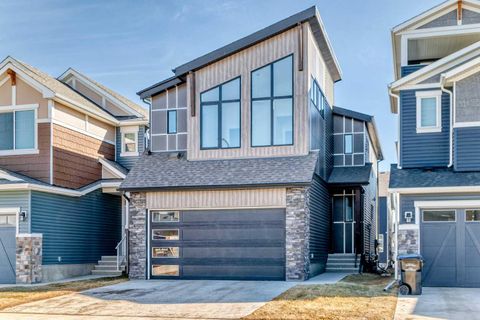 Photo of 138 Silver Spruce Grove SW, Calgary, AB T2X 5M2 (MLS # A2297424)