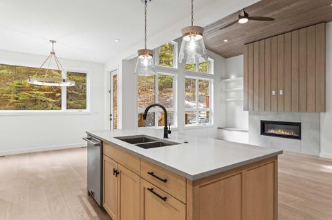 Photo of 249B Three Sisters Drive, Canmore, AB T1W 2M4 (MLS # A2268384)