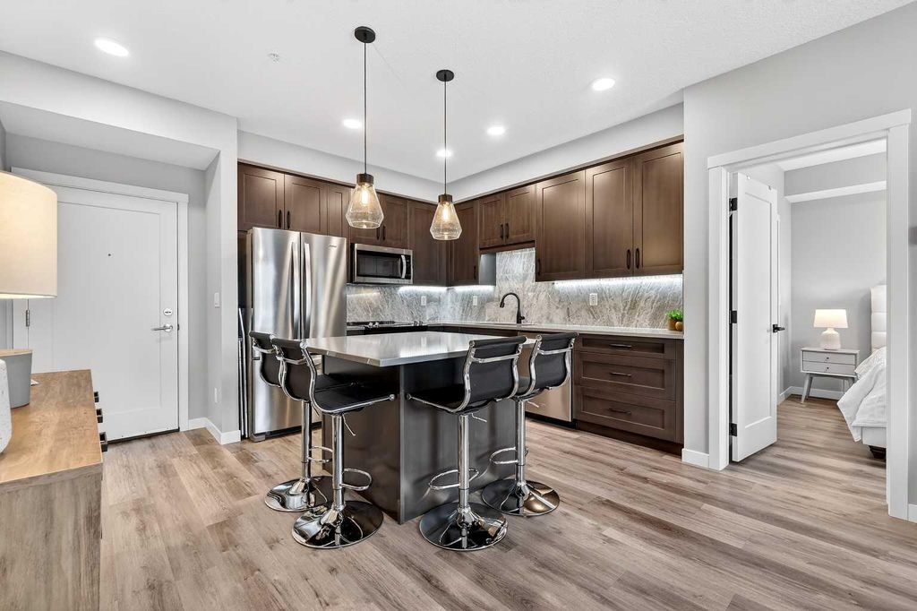 Photo of 150 Shawnee Square SW #401, Calgary, AB T2Y 0T6 (MLS # A2313019)