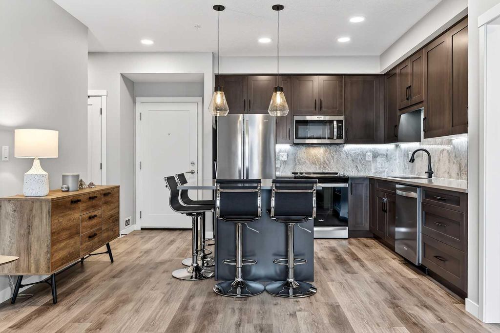 Photo of 150 Shawnee Square SW #401, Calgary, AB T2Y 0T6 (MLS # A2313019)