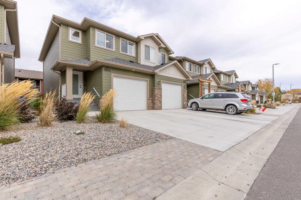 Photo of 1604 Stafford Drive N #1, Lethbridge, AB T1H 2C5 (MLS # A2350437)