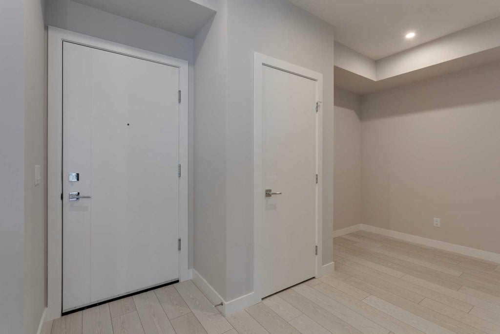 Photo of 8370 Broadcast Avenue SW #206, Calgary, AB T3H 6L3 (MLS # A2322878)