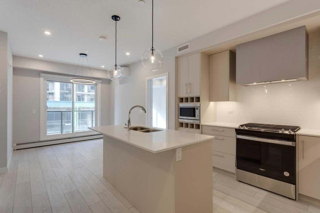Photo of 8370 Broadcast Avenue SW #206, Calgary, AB T3H 6L3 (MLS # A2322878)