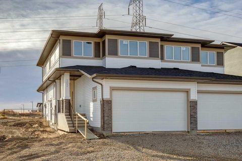 Photo of 303 Dawson Dock Way, Chestermere, AB T1X 2X2 (MLS # A2268612)