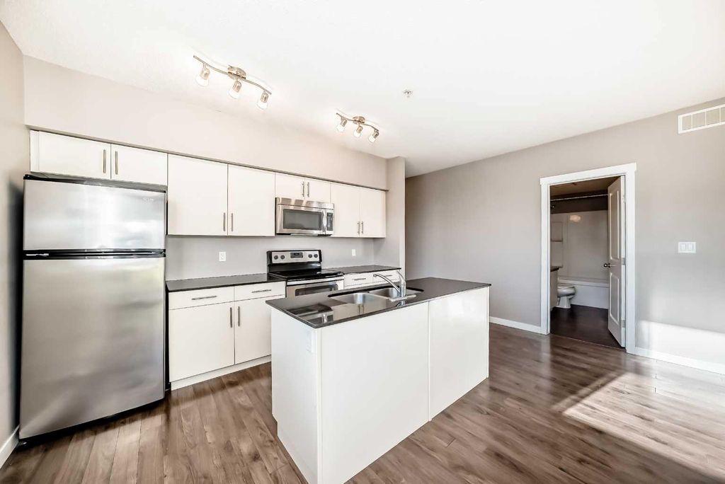 Photo of 1740 9 Street NW #304, Calgary, AB T2M 4Z5 (MLS # A2299812)