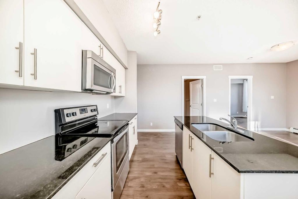 Photo of 1740 9 Street NW #304, Calgary, AB T2M 4Z5 (MLS # A2299812)