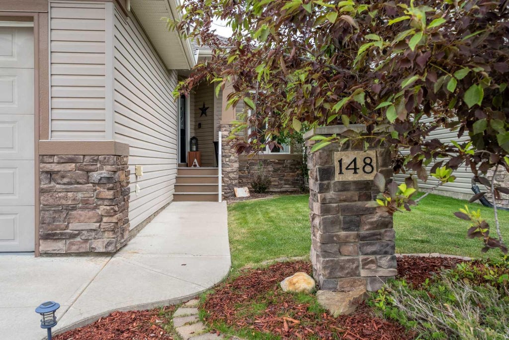 Photo of 148 Cimarron Park Circle, Okotoks, AB T1S 2L6 (MLS # A2319137)