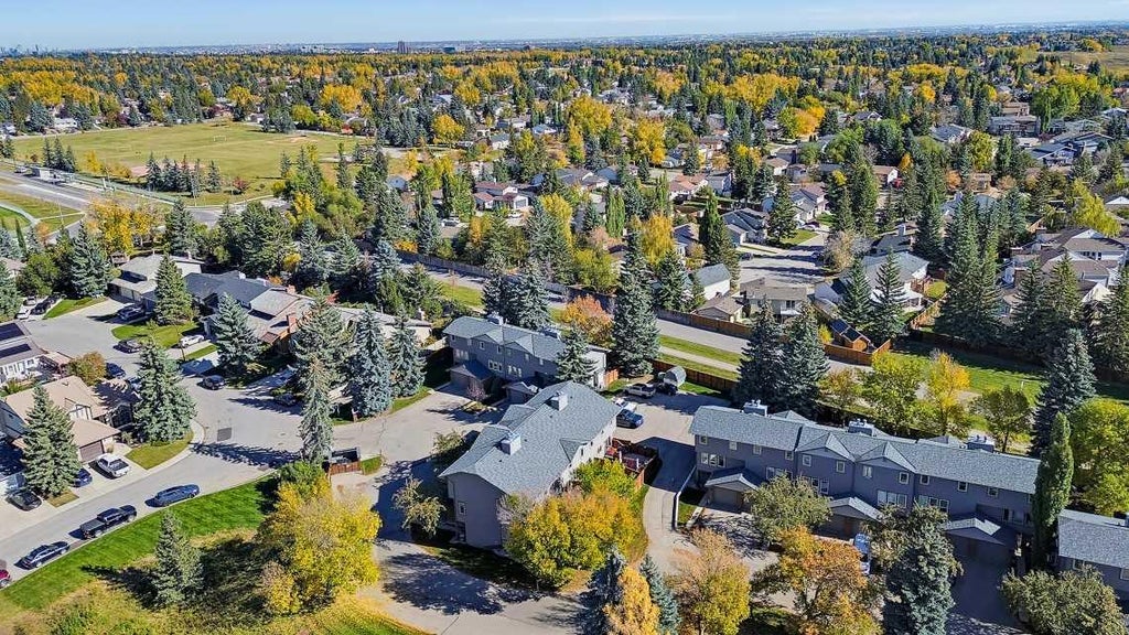 Photo of 64 Woodacres Crescent SW #5, Calgary, AB T2W 4V6 (MLS # A2349998)