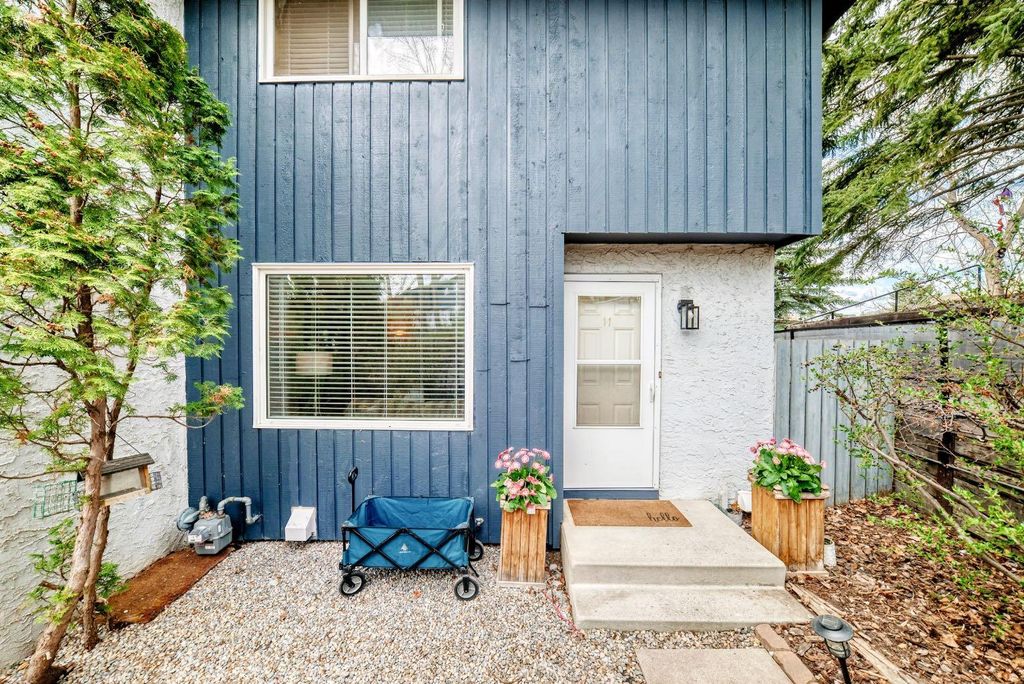 Photo of 800 Bowcroft Place #11, Cochrane, AB T4C 1B9 (MLS # A2309978)