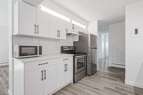 Photo of 6919 Elbow Drive SW #113, Calgary, AB T2V 0E6 (MLS # A2336343)