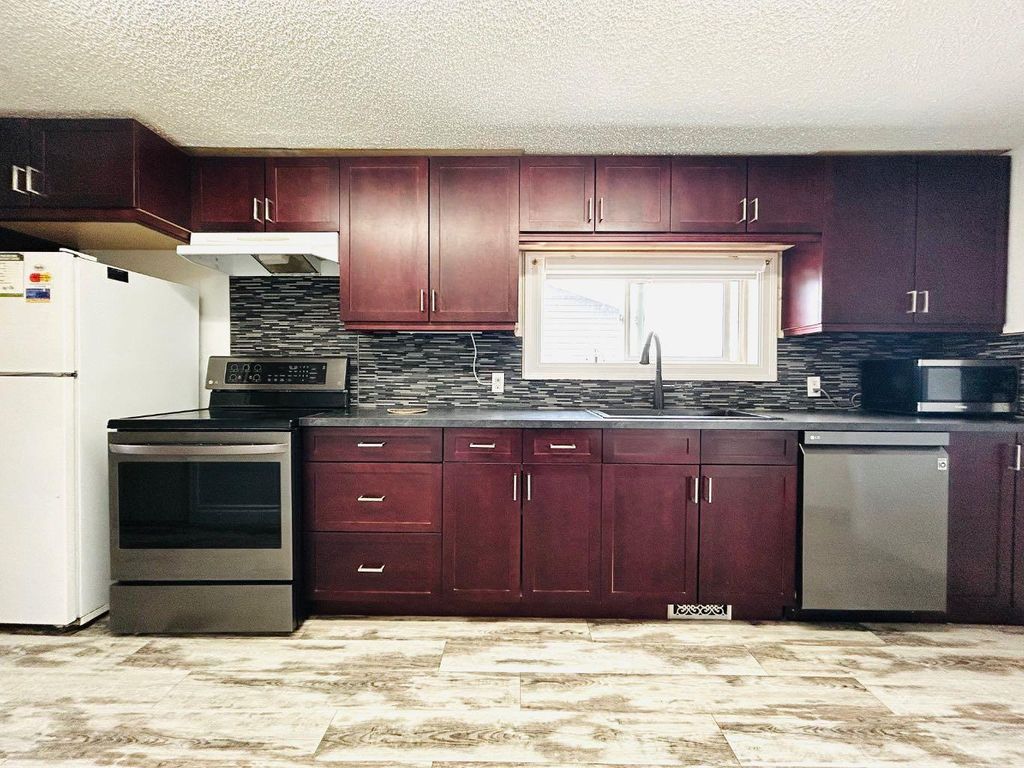 Photo of 106 3 Avenue E, Oyen, AB T0J 2J0 (MLS # A2295062)