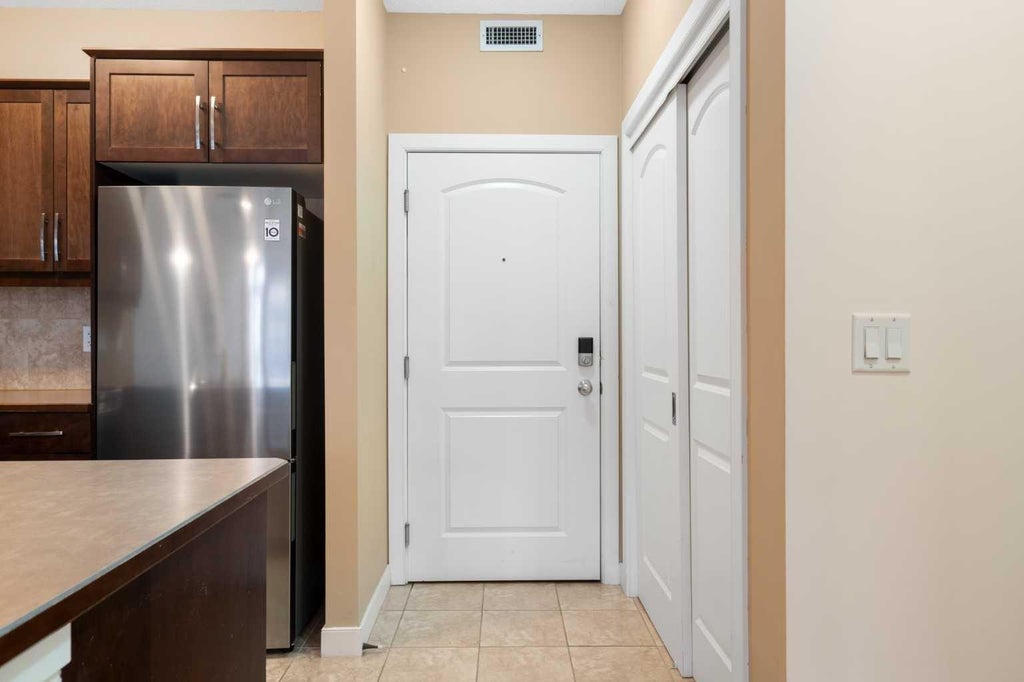 Photo of 15304 Bannister Road SE #210, Calgary, AB T2X 0M8 (MLS # A2340709)