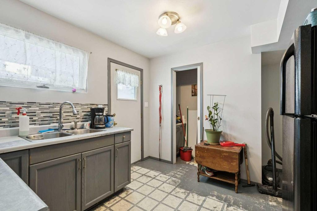 Photo of 619 Merrill Drive NE, Calgary, AB T2E 8Y5 (MLS # A2287914)