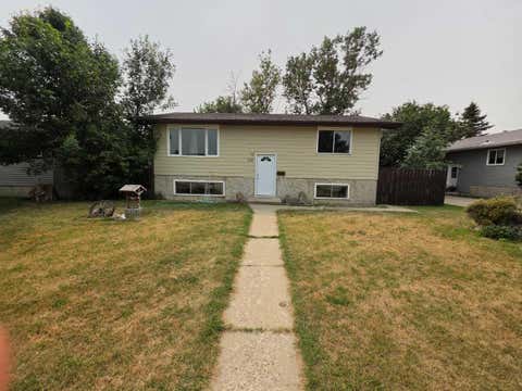 Photo of 715 Rosewood Avenue, Picture Butte, AB T0K 1V0 (MLS # A2335955)
