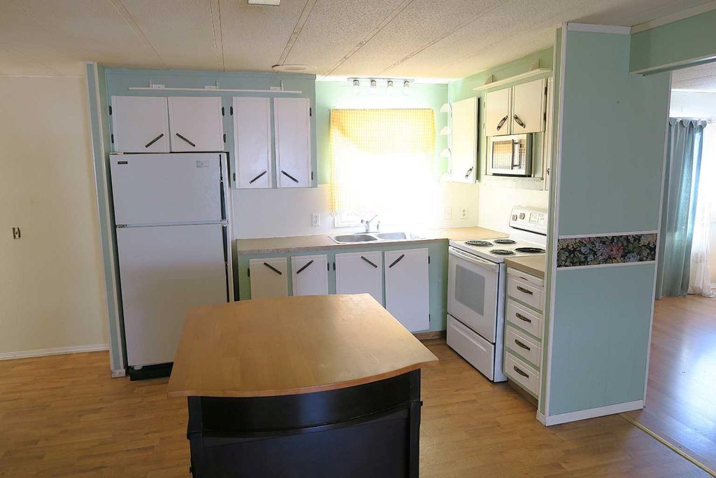 Photo of 316 3 Street N, Vulcan, AB T0L 2B0 (MLS # A2329811)