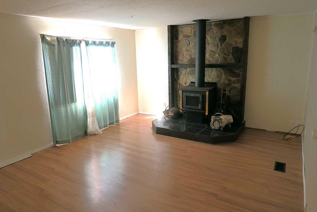 Photo of 316 3 Street N, Vulcan, AB T0L 2B0 (MLS # A2329811)