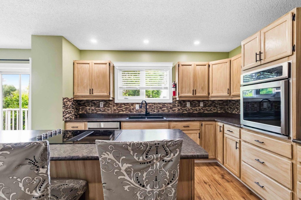 Photo of 213 Bacon Place, Fort McMurray, AB T9K 1Z8 (MLS # A2326810)