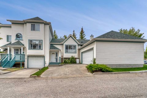 Photo of 15 Rocky Ridge Gate NW #1, Calgary, AB T3G 4P6 (MLS # A2321069)