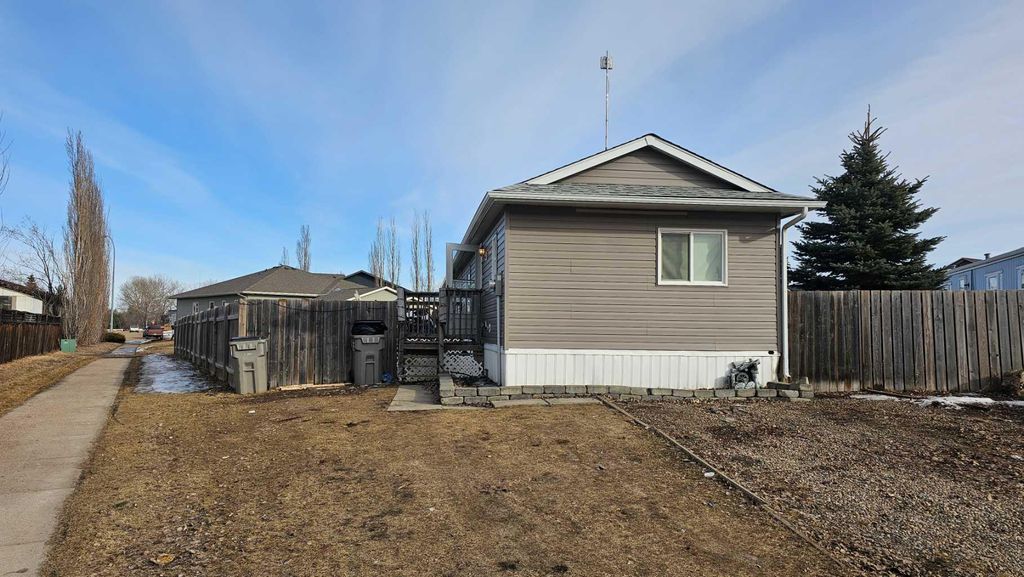 Photo of 6001 53 Avenue Close, Stettler, AB T0C 2L2 (MLS # A2296360)