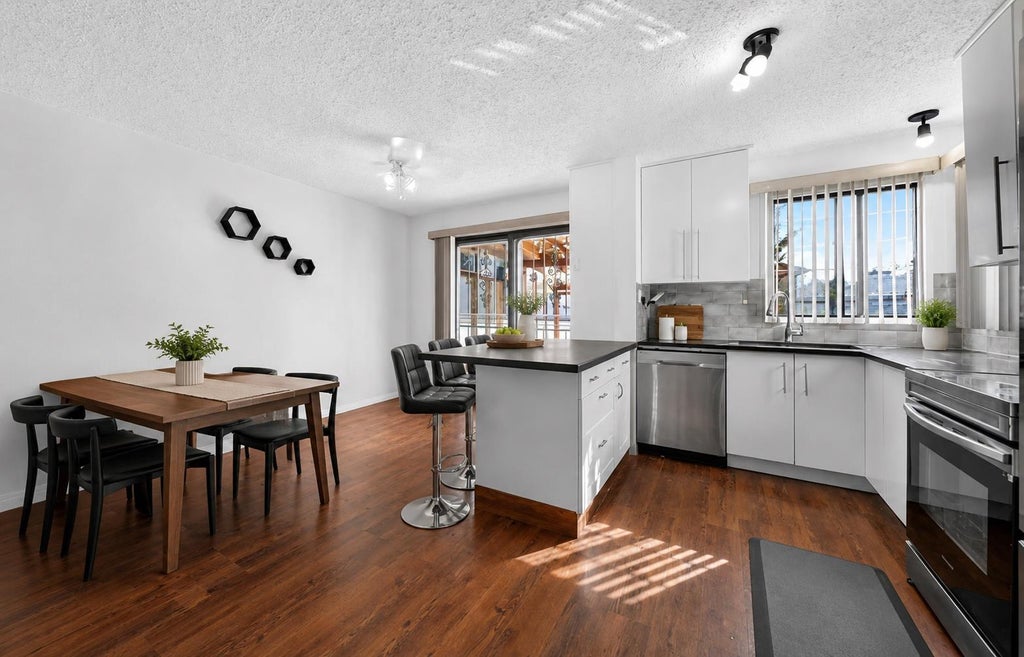 Photo of 6663 Temple Drive NE, Calgary, AB T1Y 5S1 (MLS # A2348053)