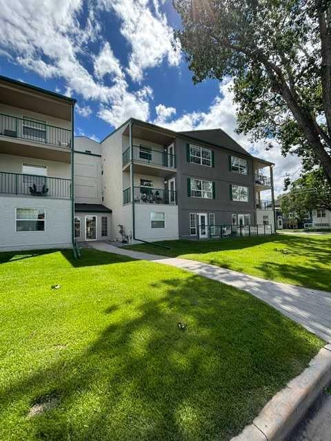 Photo of 105 7 Avenue SE #302, High River, AB T1V 1V8 (MLS # A2321945)