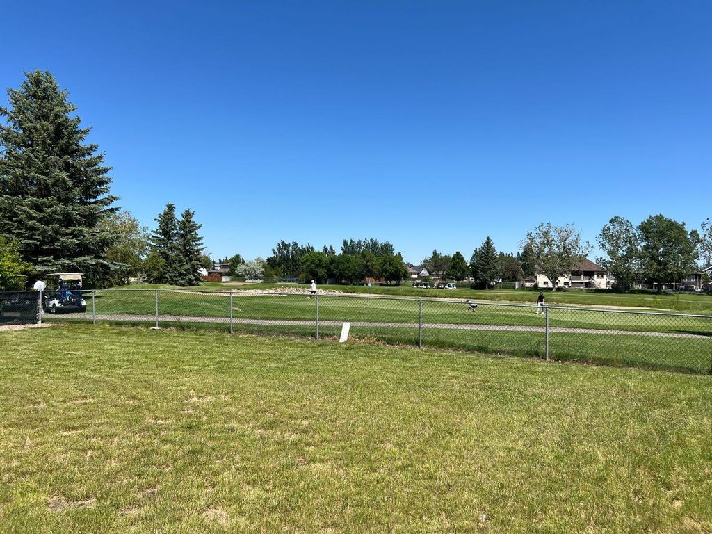 Photo of 105 Fairway Drive, Coaldale, AB T1M 1H1 (MLS # A2309207)