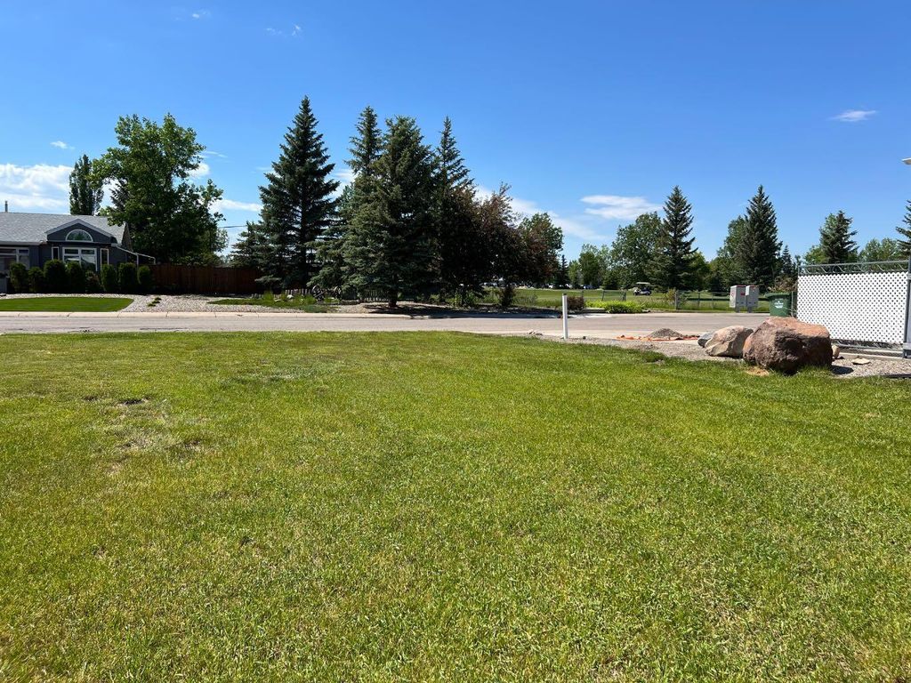 Photo of 105 Fairway Drive, Coaldale, AB T1M 1H1 (MLS # A2309207)