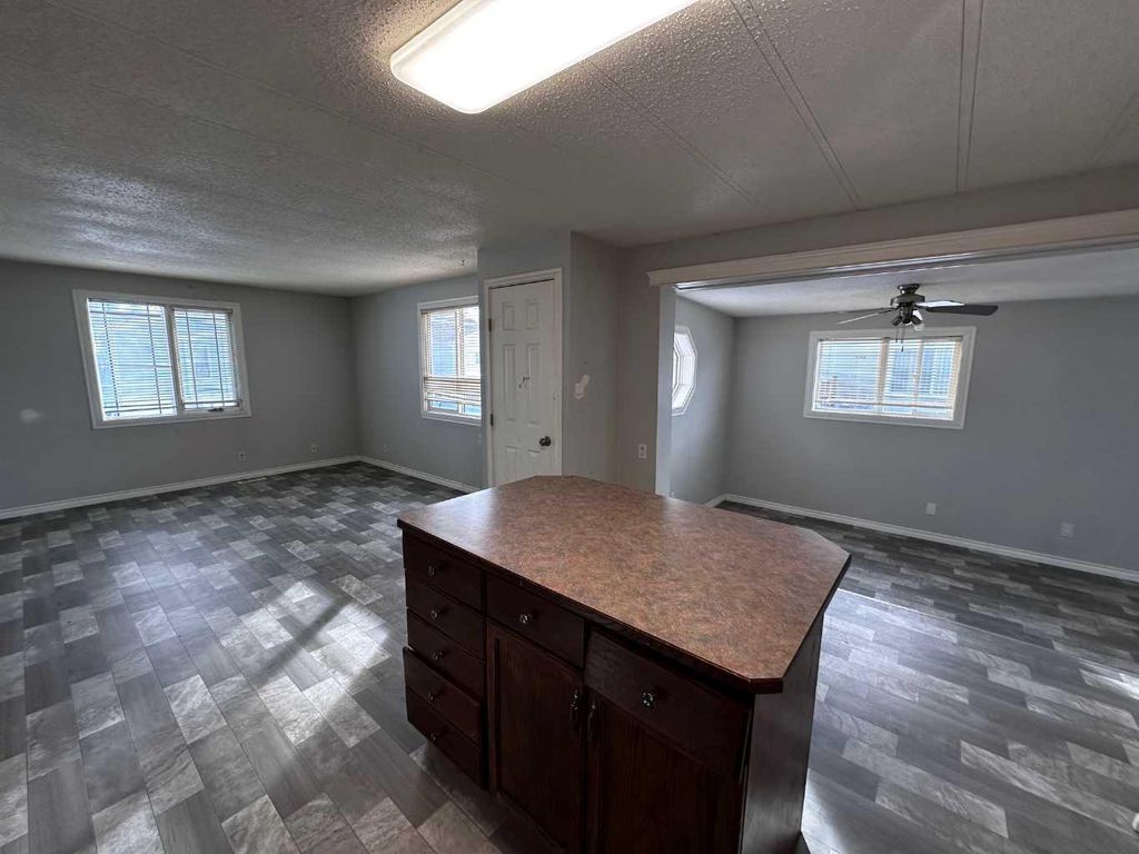 Photo of 5103 61 Avenue #8, Olds, AB T4H 1E6 (MLS # A2294892)