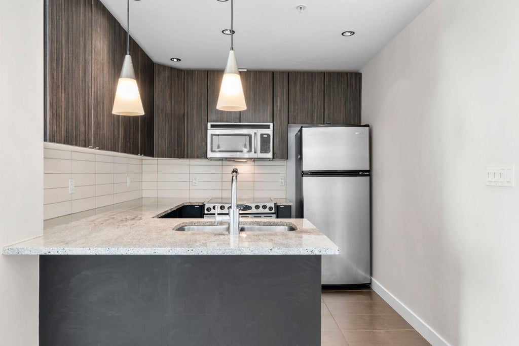 Photo of 788 12 Avenue SW #1102, Calgary, AB T2R 0H1 (MLS # A2337238)