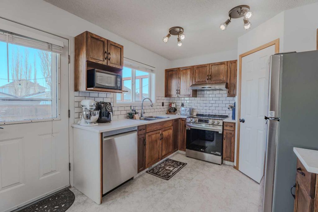 Photo of 68 Bridleridge Gardens SW, Calgary, AB T2Y 4C9 (MLS # A2287128)