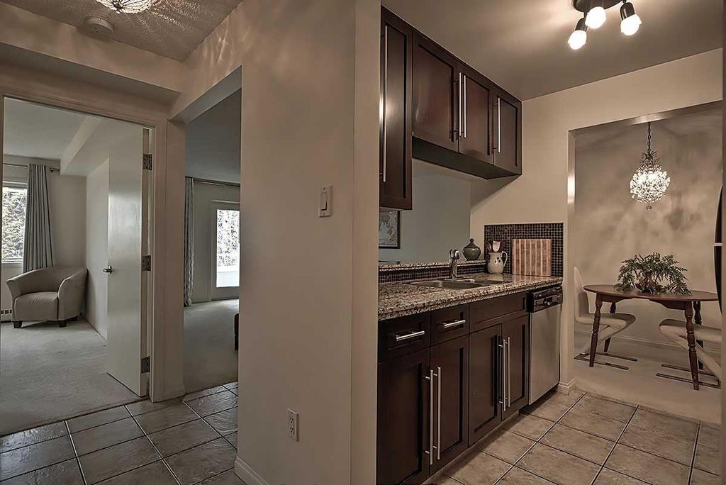 Photo of 790 Kingsmere Crescent SW #211, Calgary, AB T2V 2G9 (MLS # A2313169)