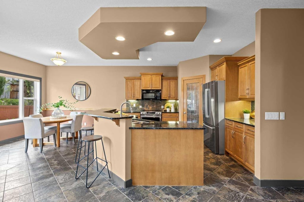 Photo of 139 Tuscany Ridge Close NW, Calgary, AB T3L 2K6 (MLS # A2336244)