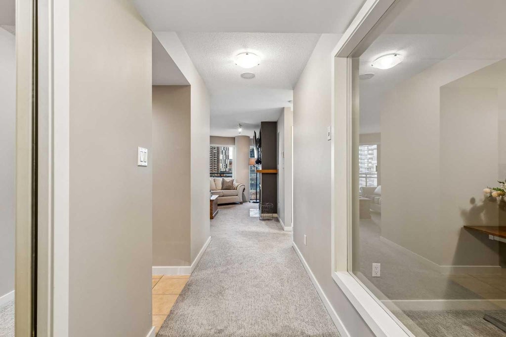 Photo of 1088 6 Avenue SW #903, Calgary, AB T2P 5N3 (MLS # A2353458)