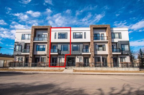Photo of 15 Rosscarrock Gate SW #109, Calgary, AB T3C 1E6 (MLS # A2286369)