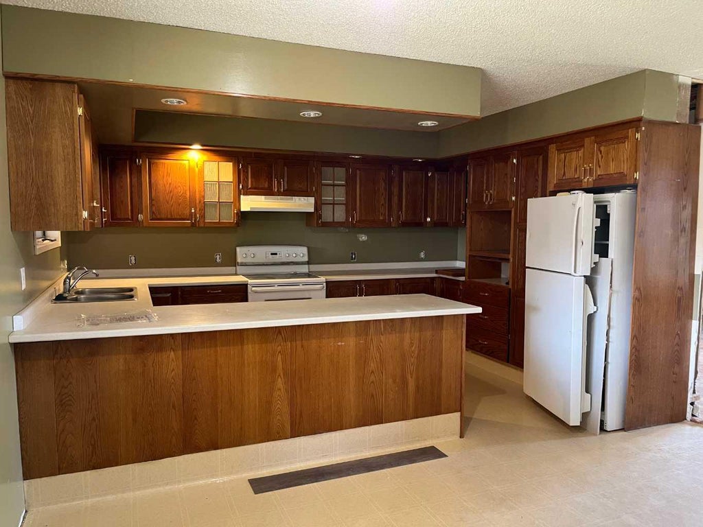 Photo of 310E 300 N, Raymond, AB T0K 2S0 (MLS # A2346635)