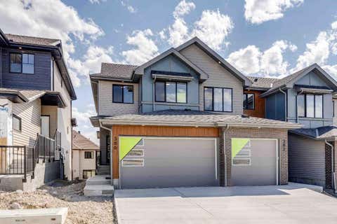 Photo of 386 Heritage Boulevard, Cochrane, AB T4C 3K8 (MLS # A2333117)