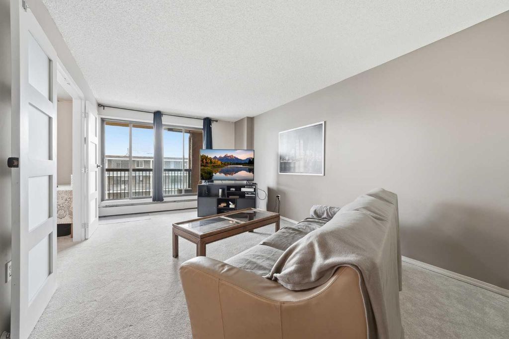 Photo of 718 12 Avenue SW #704, Calgary, AB T2R 0H7 (MLS # A2299180)