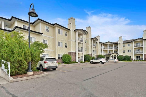 Photo of 72 Quigley Drive #115, Cochrane, AB T4C 2K6 (MLS # A2335665)