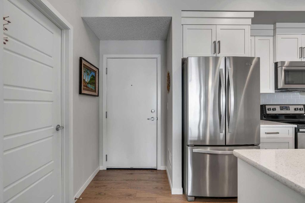 Photo of 6603 New Brighton Avenue SE #311, Calgary, AB T2Z 5E5 (MLS # A2279871)