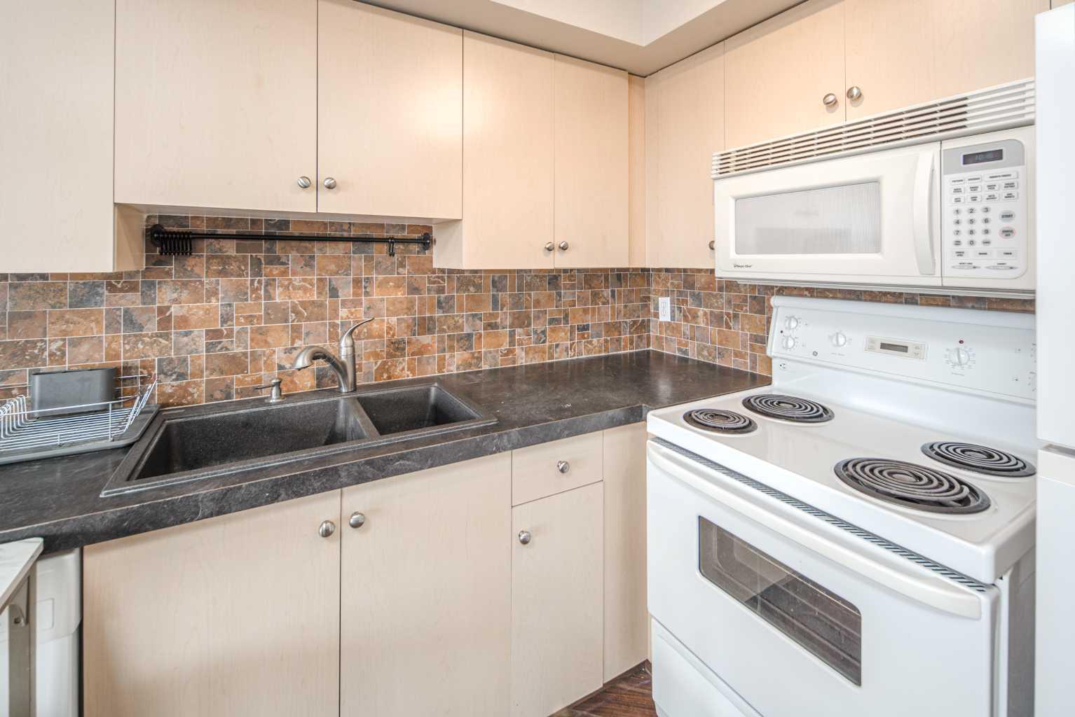 17 Country Village Bay NE 307