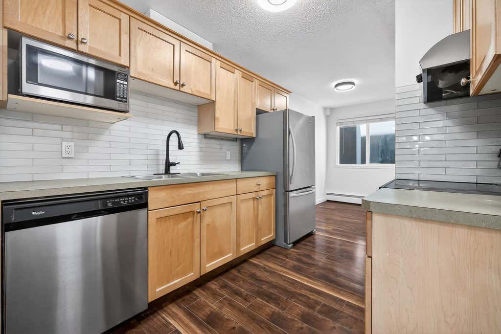 Photo of 835 19 Avenue SW #109, Calgary, AB T2T 0H6 (MLS # A2327562)