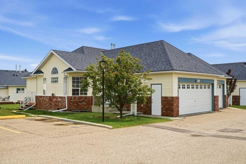 Photo of 12 Woodside Rise NW #47, Airdrie, AB T2B 2L3 (MLS # A2325524)