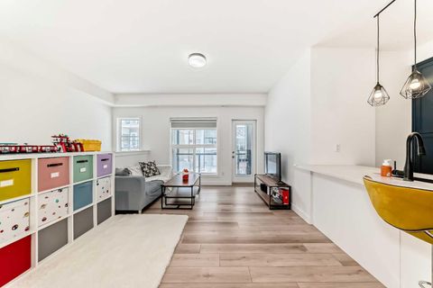 Photo of 44 Spring Creek Common SW, Calgary, AB T2E 6E2 (MLS # A2305854)