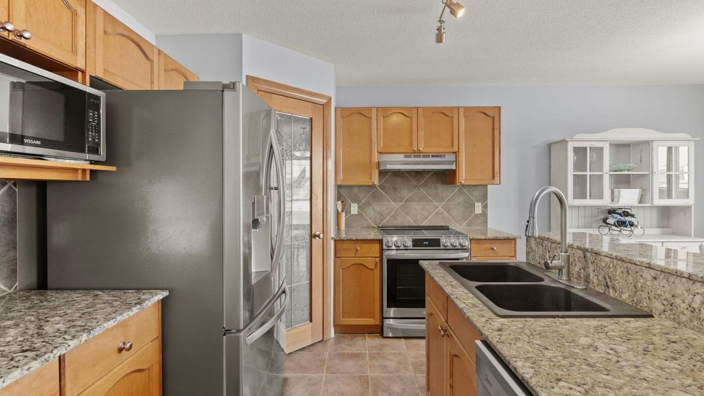 Photo of 158 Covemeadow Road NE, Calgary, AB T3K 6E7 (MLS # A2282210)