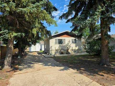 Photo of 1026 11 Avenue, Wainwright, AB T9W 1K6 (MLS # A2339404)